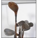 A collection of vintage gold clubs being marked for St Andrews ( see illustrations )