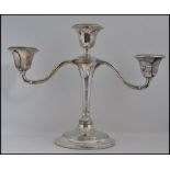 A silver hallmarked 3 sconce candelabra bearing hallmarks for Birmingham 1909 makers illegible,