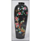 An Art 1930's Crown Devon ' Chelsea ' pattern vase having black ground with asiatic pheasant