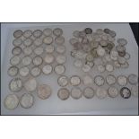 A good collection of silver coins to include 1 George IV 1626 shilling, 25 Edward VII shillings,