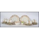 A Victorian chintz pattern part tea service comprising cups, saucers,