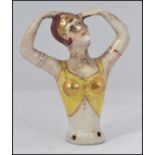 A 1930's Art Deco style pin dolly of cer