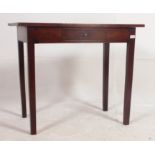 A 19th century mahogany side table raised on squared legs with a fitted central frieze drawer and