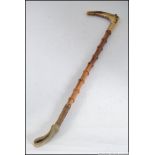 A 15ct gold Victorian bamboo riding crop.
