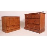 An antique style 20th century pine 2 over 2 chest of drawers with knob handles together with