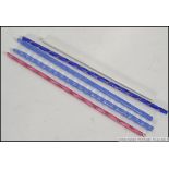 A collection of coloured 20th century Nailsea glass twizzle sticks of varying colours red, blue,