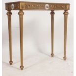 A stunning 19th / 20th century gilt console table, being raised on column legs,