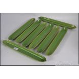 A collection of 8 1970's ceramic vintage green glazed sweetcorn dishes - retro kitchenalia.