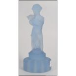 A 1930's Art Deco frosted blue glass flower arranging centrepiece designed as a female figure and