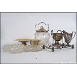 A mixed collection of mid century silver plate items to include bon bon dish , jugs ,