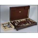 A vintage cased canteen of cutlery together with flatwares to include Walker & Hall etc.