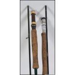 A graphite two piece fly fishing salmon rod,