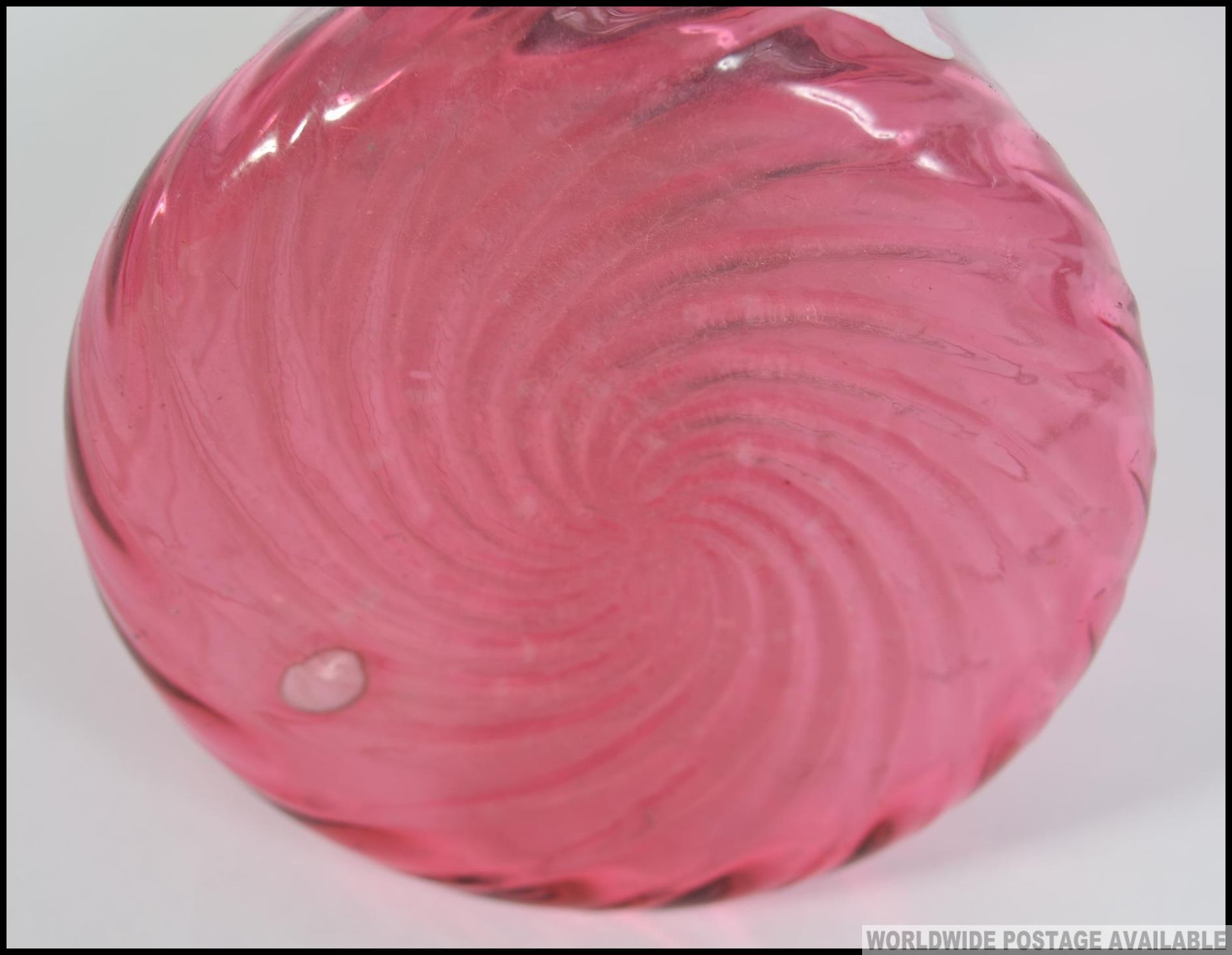 An early 20th century Cranberry glass sugar sifter having spiral glass tapering body with silver - Image 4 of 4