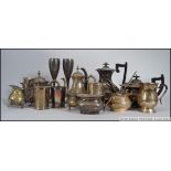 A collection of silver and plated items to include flatware, teapots,