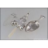 A silver babies rattle with whistle in form of cat ,