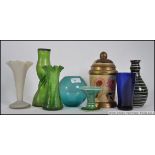 A collection of studio art glass vases together with a biscuit barrel and other studio ceramics etc.