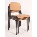 A set of 4 vintage Industrial stacking metal and panel wood chairs.