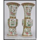 A pair of 19th century Chinese / Canton / Cantonese gu vases having famille rose foliate