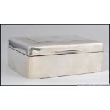 An Edwardian Sampson Mordan & Co silver hallmarked table top cigarette case with engine turned lid,