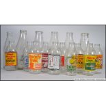 A collection of vintage advertising milk bottles dating from the 1970's to include Ready Brek,