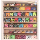 A collection of retro novelty childrens / portable cameras, all of different designs,