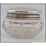 A cut glass pin dish having a silver hallmarked collar, Birmingham assay marks,