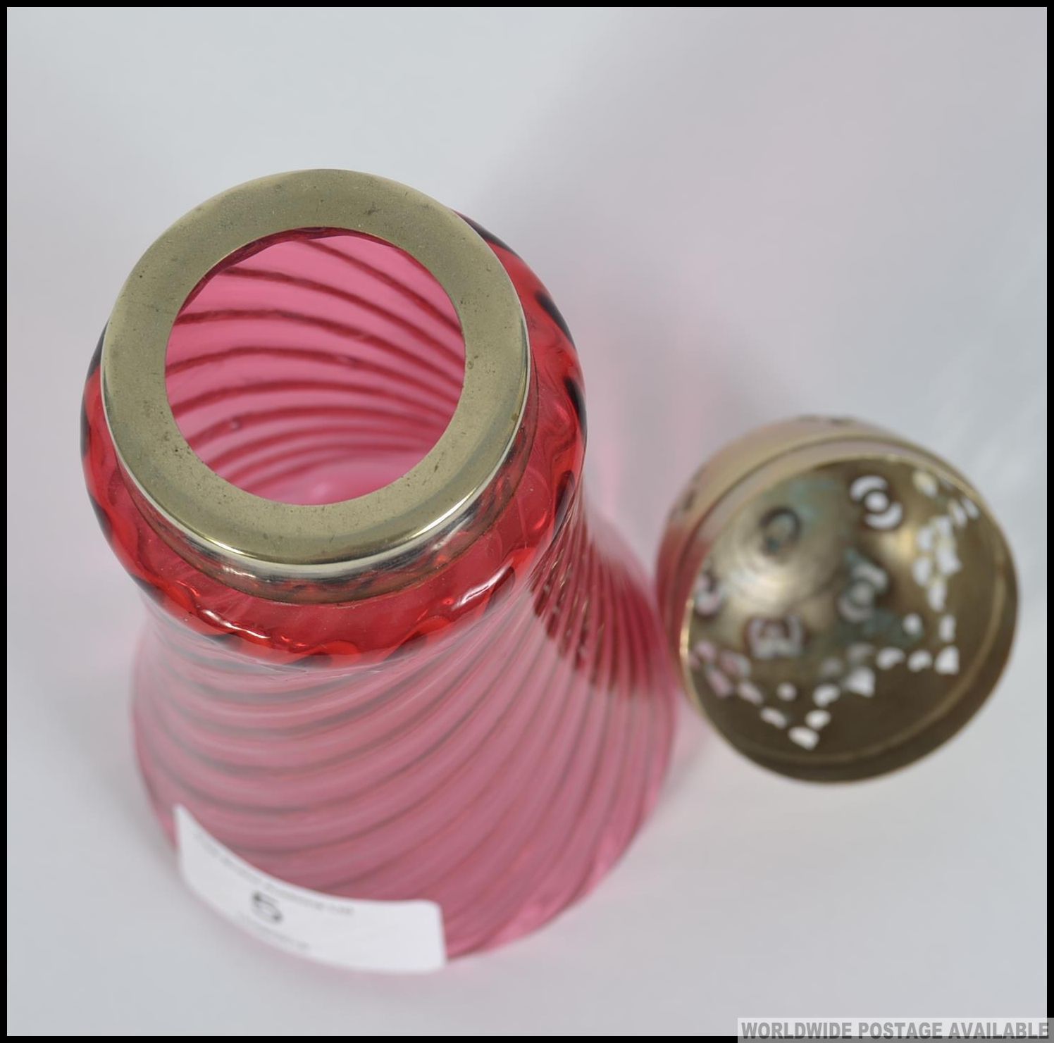 An early 20th century Cranberry glass sugar sifter having spiral glass tapering body with silver - Image 3 of 4