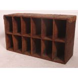 An early 20th century Industrial pine office pigeon hole stationary cabinet cubby.