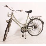 A vintage 1970's ladies Raleigh Caprice bicycle / bike having original metallic paint etc.