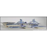 A good collection of blue and white ceramics to include Victorian and 20th century examples ,