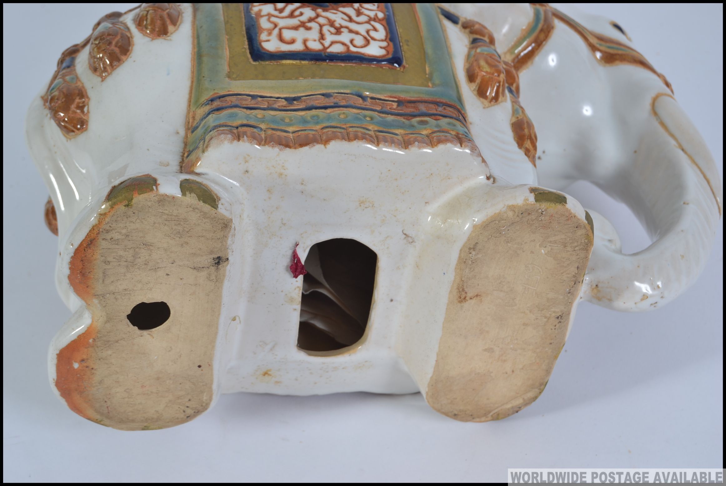 A 20th century large Chinese ceramic planter / stool in the form of an Elephant. Measures: 27cm H. - Image 4 of 4