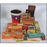 A collection of vintage and retro advertising tins / boxes to include Cadburys , Thermogene ,