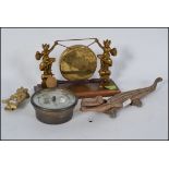 A mixed lot of metalware - vintage Pixie table gong with oak base, large crocodile nutcrackers,