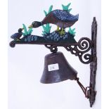 A cast iron 20th century hand painted wall decor exterior bell, with duck decoration to top.