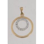 A hallmarked 9ct gold and diamond halo pendant set with diamonds in a channel setting approx 15pts.