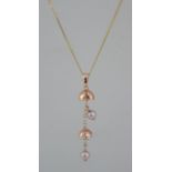 A hallmarked 9ct gold pearl drop pendant necklace with double pearl Art Nouveau style drop.