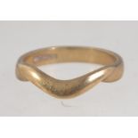A hallmarked 9ct gold ring with plain whishbone decoration. Size I.5. Weight 1.9g.