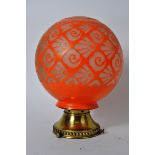 A Bohemian Art Deco globe lamp shade wit