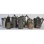 A collection of Victorian and other pewter wares to include part tea services , pint cups etc.