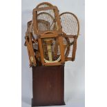 A large collection of 20th Century vintage badminton and tennis rackets