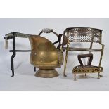 A collection of brass wares to include a coal scuttle an iron stand a various tools etc.