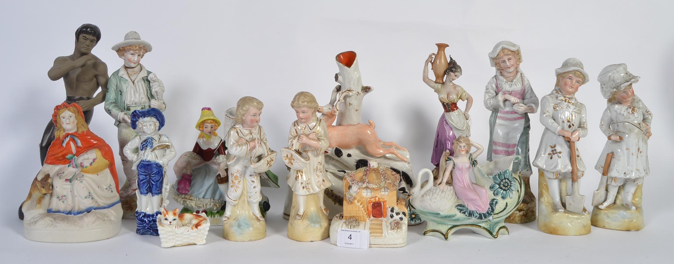 A collection of porcelain figurines to include Staffordshire flat backs , continental examples ,