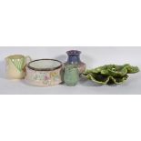 A collection of pottery to include Beswick examples and a pair of Bretby leaf dishes