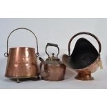 A large 19th Century copper kettle along with a coal bucket and a coal scuttle