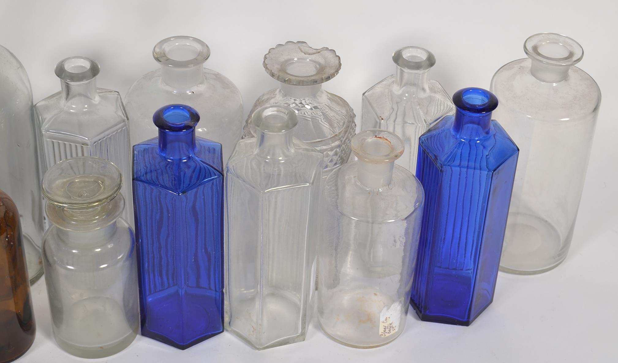 An assortment of vintage glass bottles to include Bristol blue examples, - Image 2 of 3