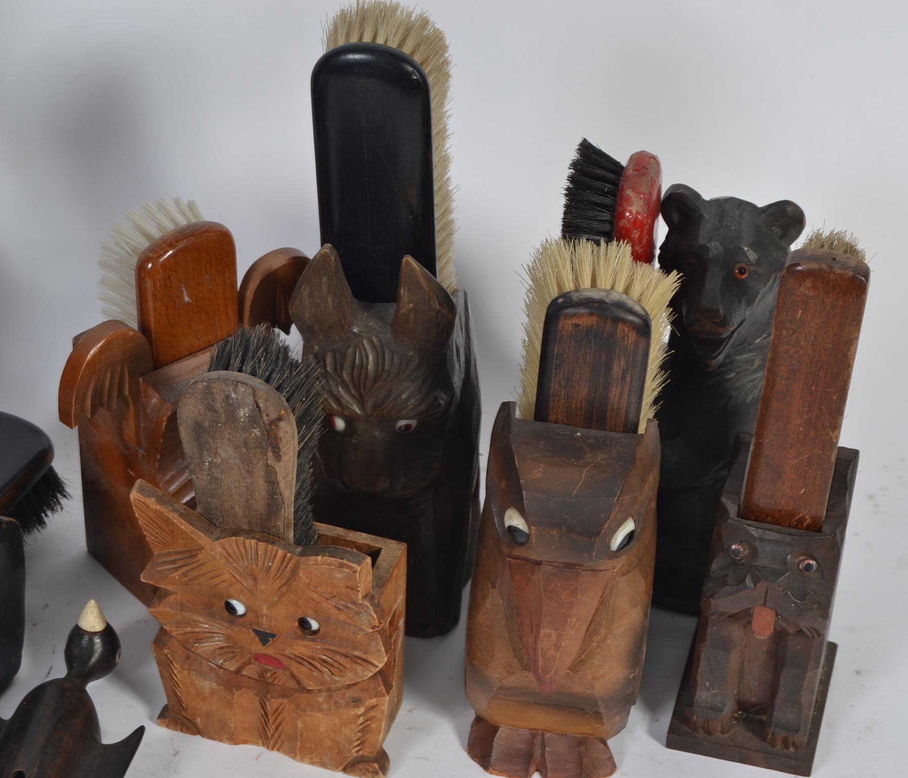 A collection of vintage animal clothes brushes holders to include three bakelite 1950s duck - Image 2 of 3