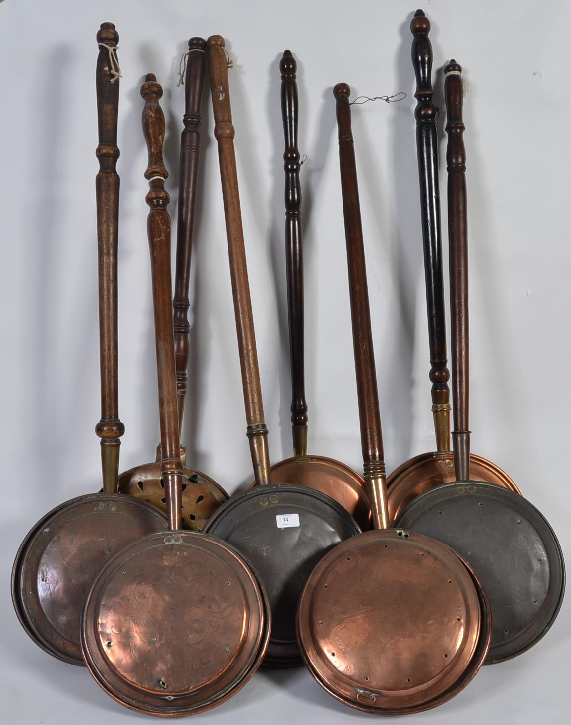 A group of 8 Victorian large copper bed pans