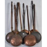 A group of 8 Victorian large copper bed pans