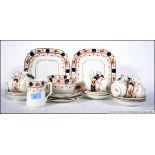 A good Victorian Imari style bone china patterned tea service consisting of trio's, creamer,