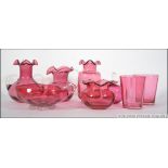 A collection of Bristol cranberry glass ( eight pieces ) to include vases,